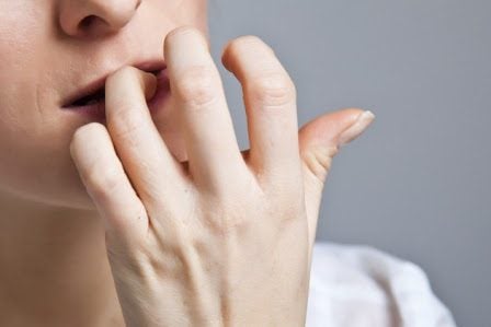 Woman in depression on gray background