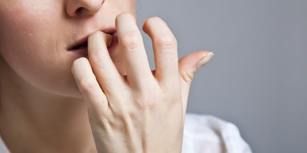 Woman in depression on gray background